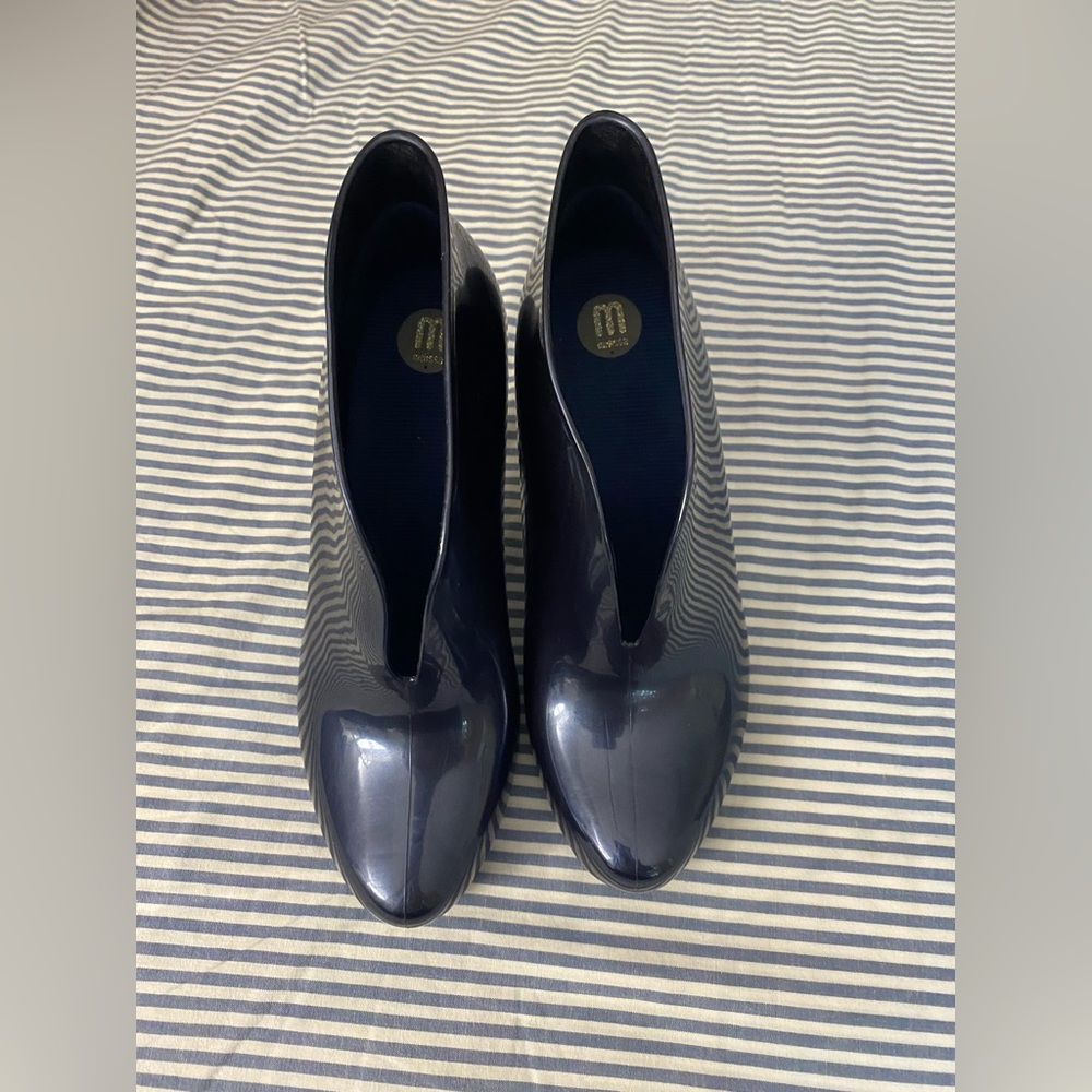 Dark blue, almost new.